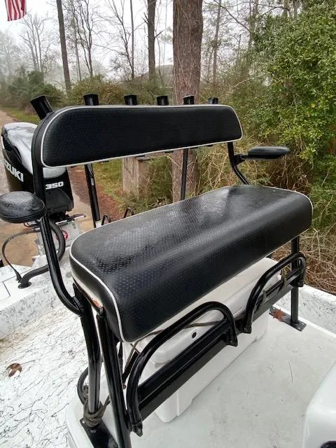 Slide: The Image of 2023 Dargel 250Kat HDX boat seat with black upholstery and rod holders. - 13