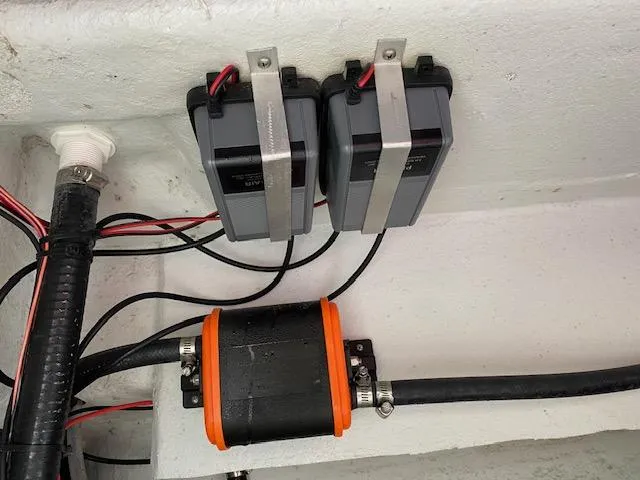 Slide: The Image of Electrical components in a 2023 Dargel 250Kat HDX boat, featuring wiring and connectors. - 20