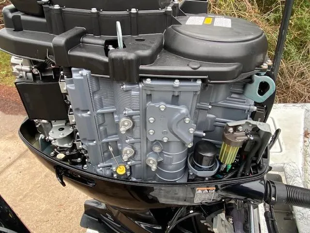Slide: The Image of Close-up of a 2023 Dargel 250Kat HDX boat engine, showcasing intricate mechanical details. - 7