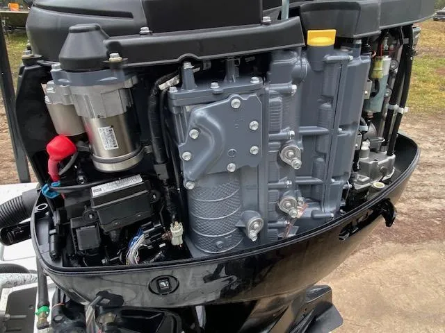 Slide: The Image of Close-up of a 2023 Dargel 250Kat HDX boat engine, showcasing intricate mechanical components. - 8