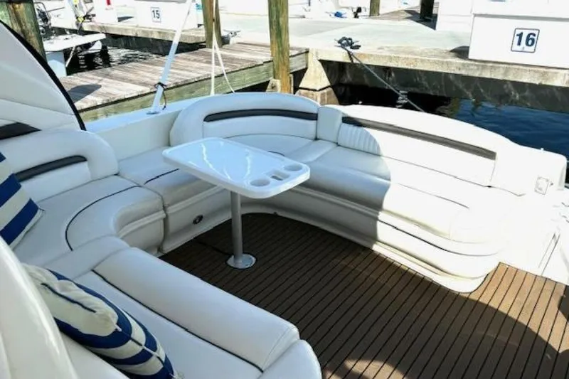 Slide: The Image of Interior view of 2003 Sea Ray 420 Sundancer yacht cockpit with clear windows and control panel. - 25