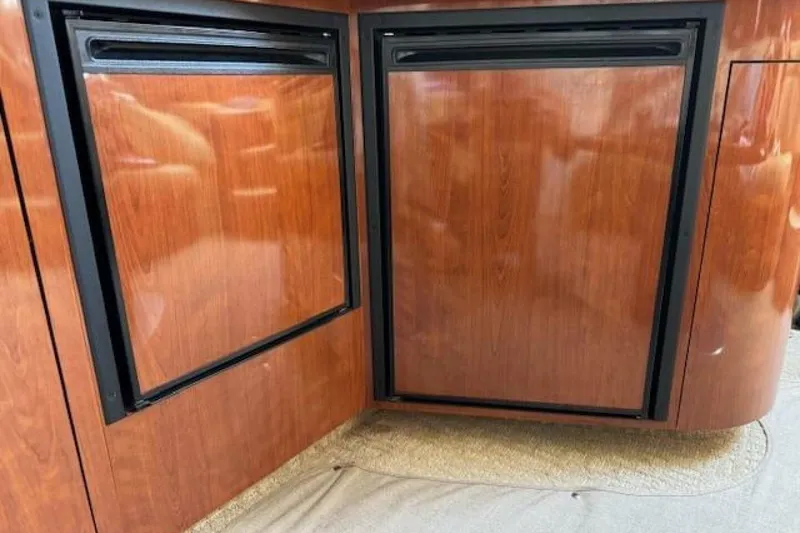 Slide: The Image of Cozy cabin interior of 2003 Sea Ray 420 Sundancer with comfortable bedding. - 38