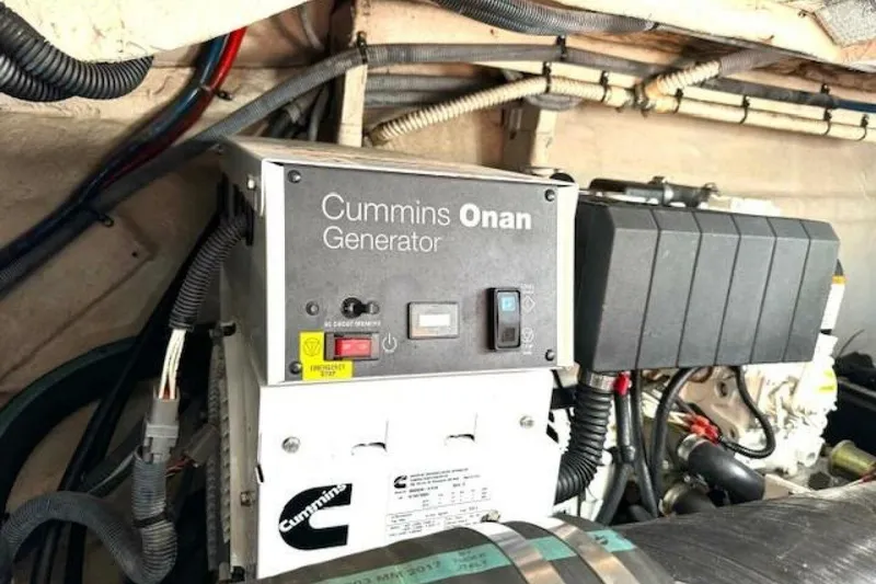 Slide: The Image of 2003 Sea Ray 420 Sundancer yacht cruising on a sunny day. - 5