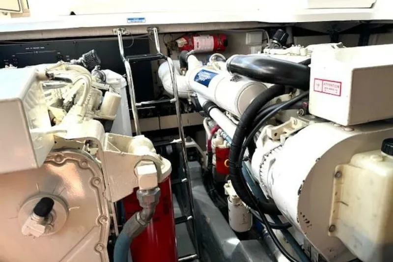 Slide: The Image of 2003 Sea Ray 420 Sundancer interior with stainless steel appliance and sleek cabinetry. - 6