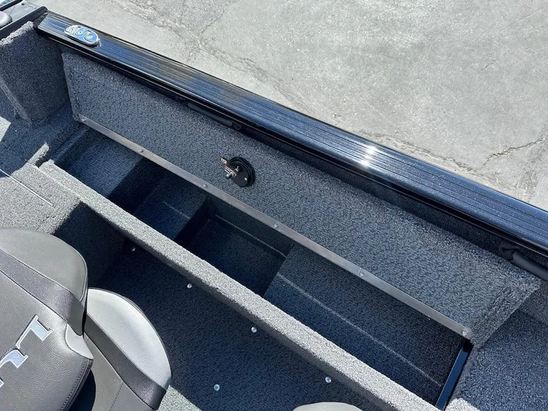 Slide: The Image of 2025 Lund 1650 Rebel XL SS boat interior storage compartments. - 15
