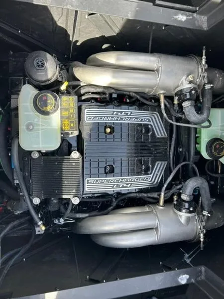 Slide: The Image of 2025 Malibu M230 engine, supercharged, detailed view of components and layout. - 2