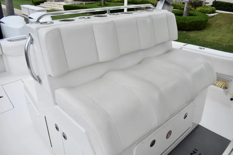 Slide: The Image of White leather seating on 2013 Invincible 42 Open Fisherman boat. - 14