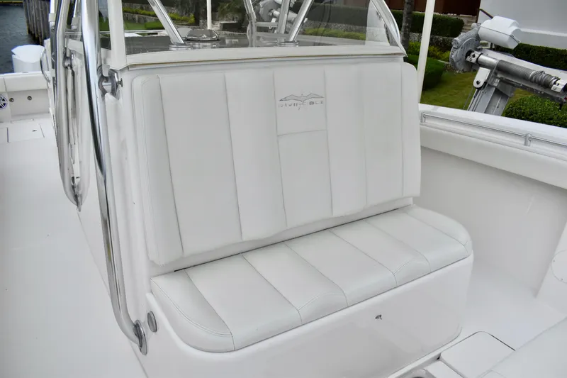 Slide: The Image of 2013 Invincible 42 Open Fisherman boat seat, white upholstery, sleek design. - 16