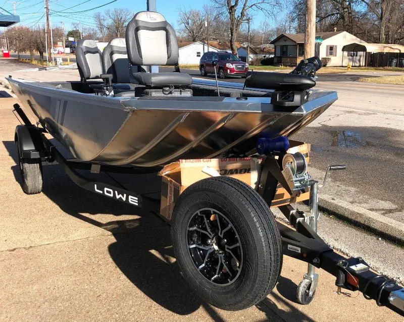 Slide: The Image of Spare tire & mount, fold away tongue, ratcheting custom fit factory storage / road cover inside the box. - 14