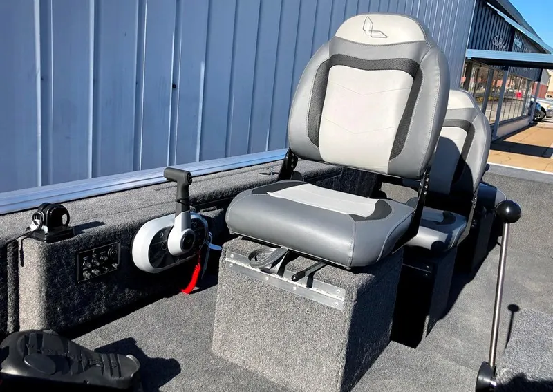 Slide: The Image of Front remote control with stick steering creates a very open floorplan for a 16' boat - 3