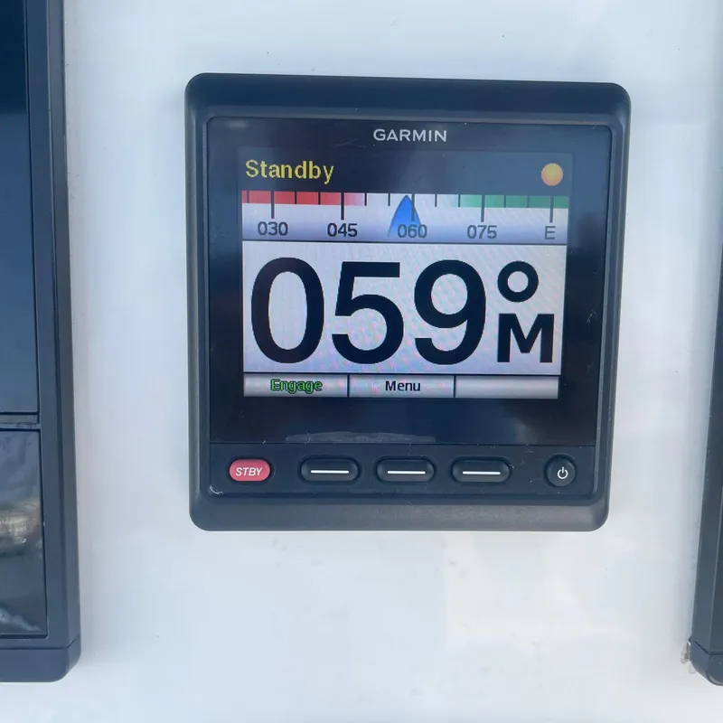 Slide: The Image of Garmin marine display on 2015 NauticStar 2200XS Offshore boat showing heading. - 14