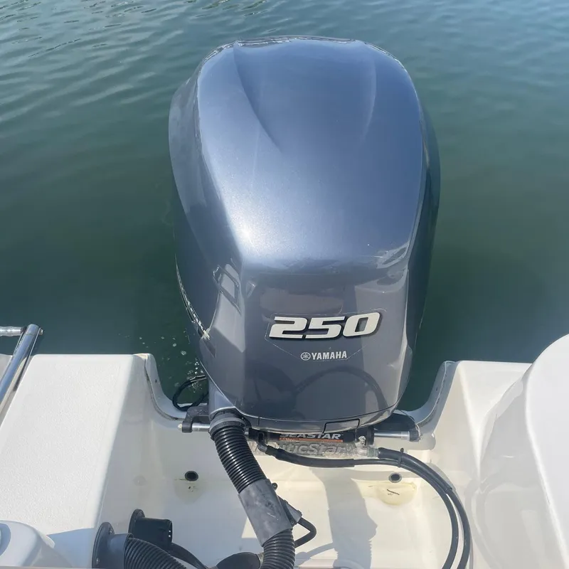 Slide: The Image of Yamaha 250 outboard motor on 2015 NauticStar 2200XS Offshore boat. - 26