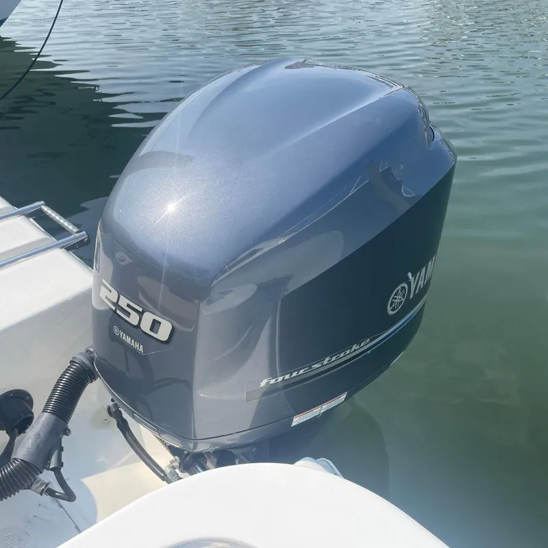 Slide: The Image of Yamaha 250 outboard motor on 2015 NauticStar 2200XS Offshore boat. - 27
