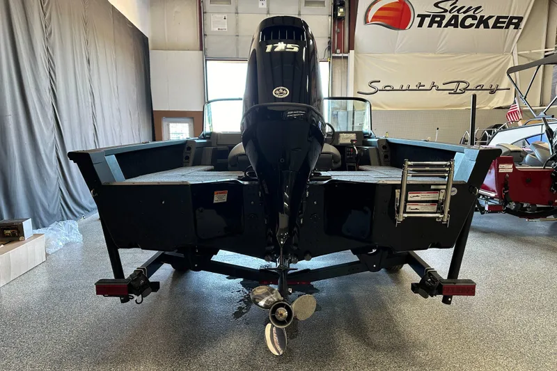 Slide: The Image of 2026 Alumacraft Competitor 185X Sport boat interior with spacious deck and windshield. - 6