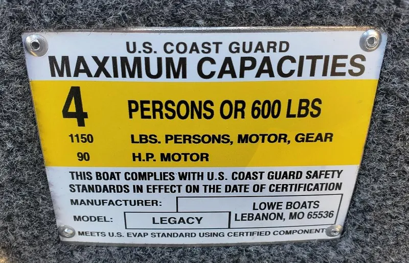 Slide: The Image of 2025 Lowe 1860 Legacy boat capacity label, U.S. Coast Guard compliant, 4 persons or 600 lbs. - 9