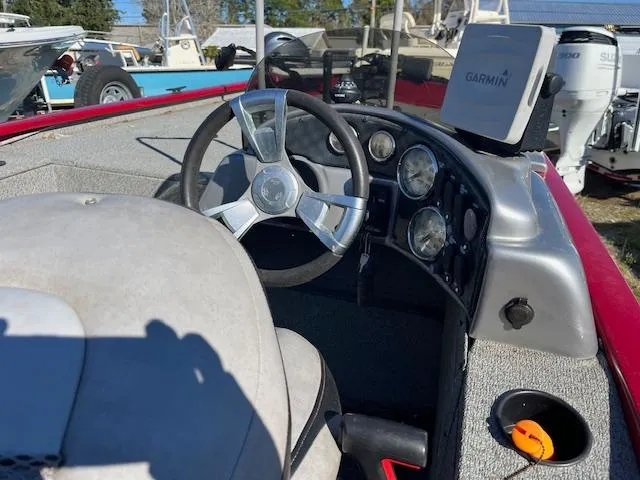 Slide: The Image of 2014 G3 176 EAGLE boat dashboard with Garmin GPS and steering wheel. - 6