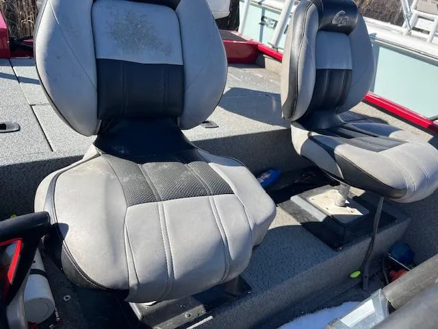 Slide: The Image of 2014 G3 176 EAGLE boat seats, gray and black, on deck. - 9