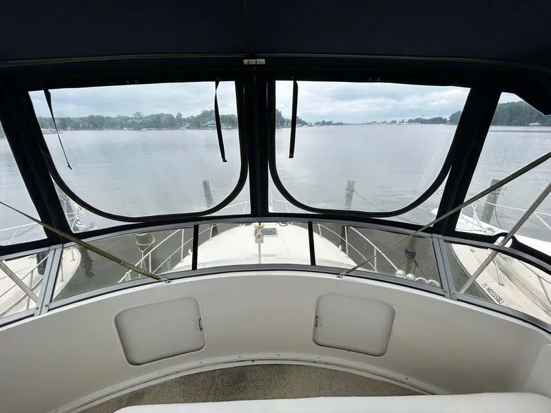 Slide: The Image of 1995 Carver 370 Aft Cabin yacht interior with scenic water view. - 20