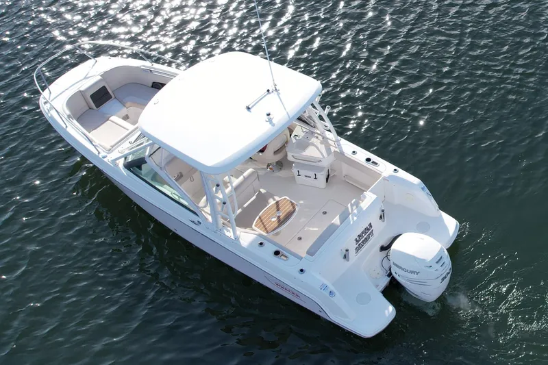 Slide: The Image of 2018 Boston Whaler 230 Vantage boat on water, aerial view. - 2