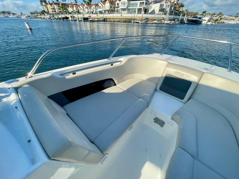 Slide: The Image of 2018 Boston Whaler 230 Vantage boat interior with waterfront view. - 30