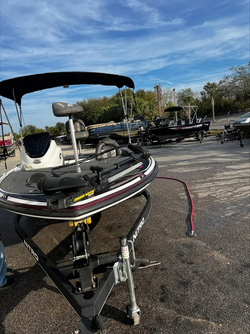 Slide: The Image of 2019 Nitro Z17 boat on trailer in outdoor setting. - 2
