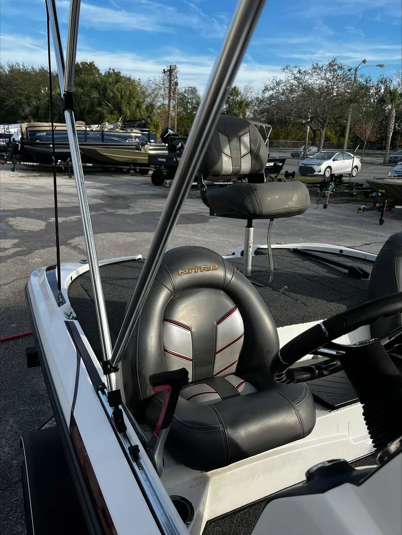 Slide: The Image of 2019 Nitro Z17 boat interior with leather seats and steering wheel. - 3