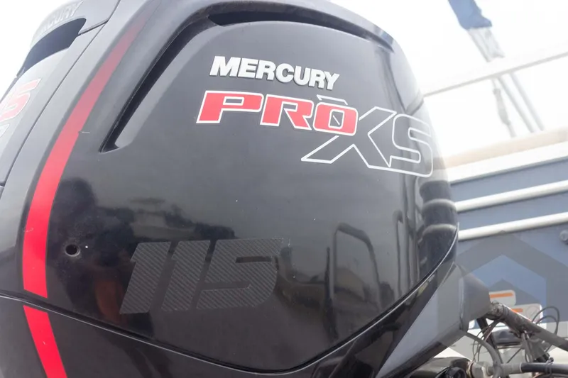 Slide: The Image of Mercury Pro XS 115 outboard motor on 2020 Sun Tracker Fishin' Barge 22 DLX. - 22