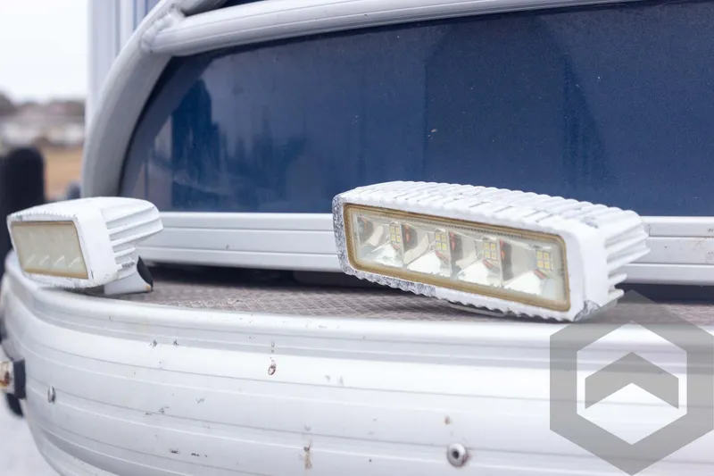 Slide: The Image of 2020 Sun Tracker Fishin' Barge 22 DLX with LED lights on the deck. - 26