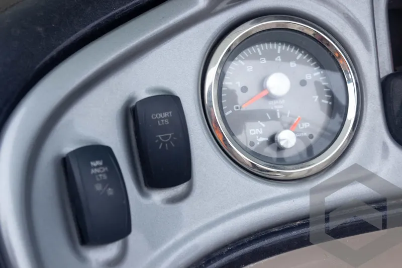 Slide: The Image of Dashboard controls of 2020 Sun Tracker Fishin' Barge 22 DLX boat. - 43