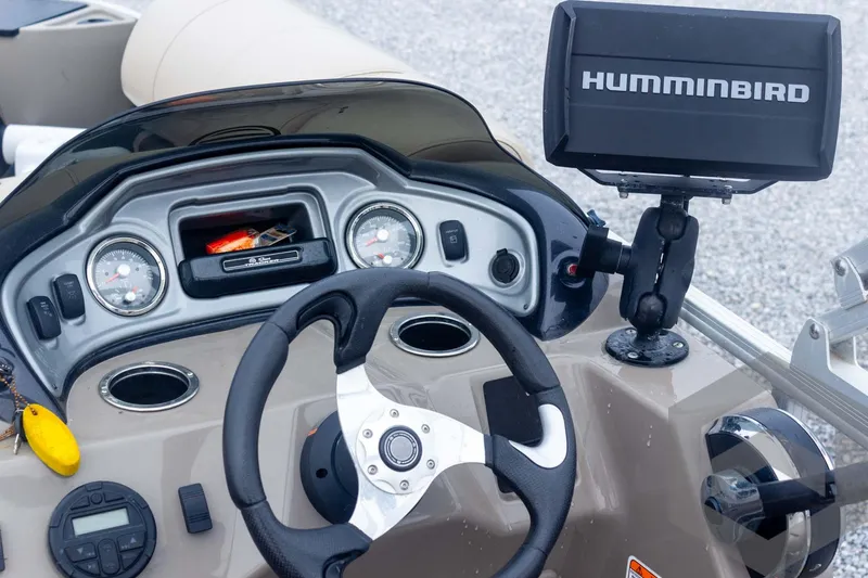 Slide: The Image of Steering console of 2020 Sun Tracker Fishin' Barge 22 DLX with Humminbird fish finder. - 46