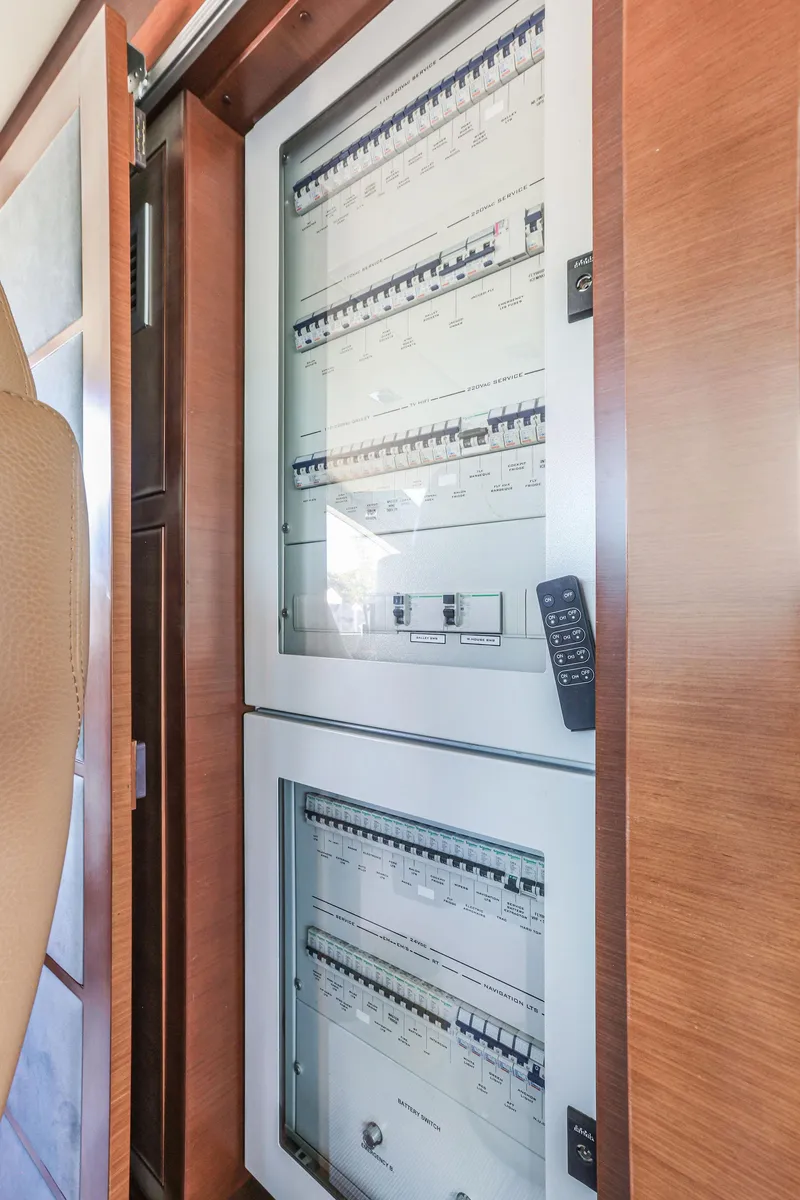 Slide: The Image of Electrical circuit breaker panel behind helm - 42