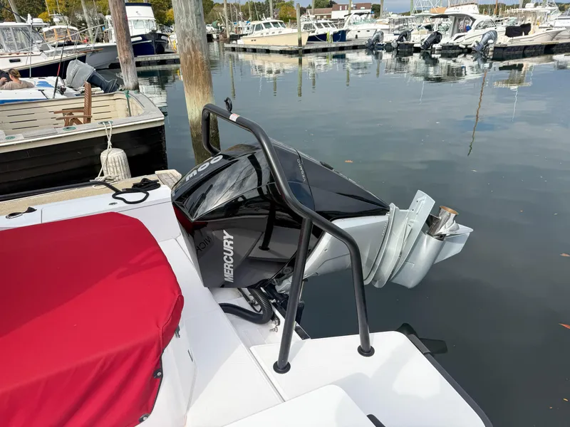 Slide: The Image of Axopar 28 CABIN 2021 with Mercury outboard engine at marina dock. - 18
