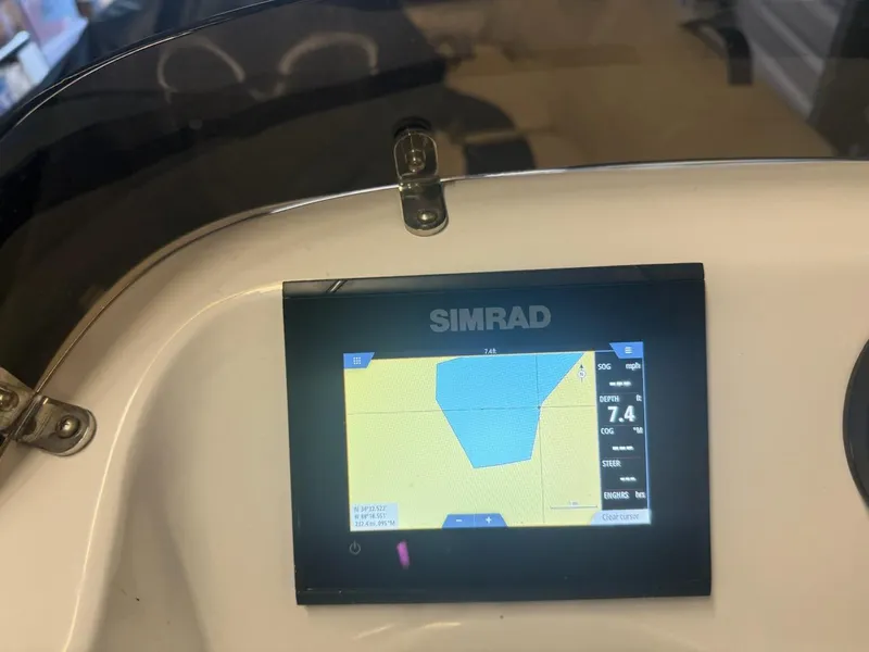Slide: The Image of Simrad navigation display on 2021 Walker Bay Generation 360 DLX boat dashboard. - 10