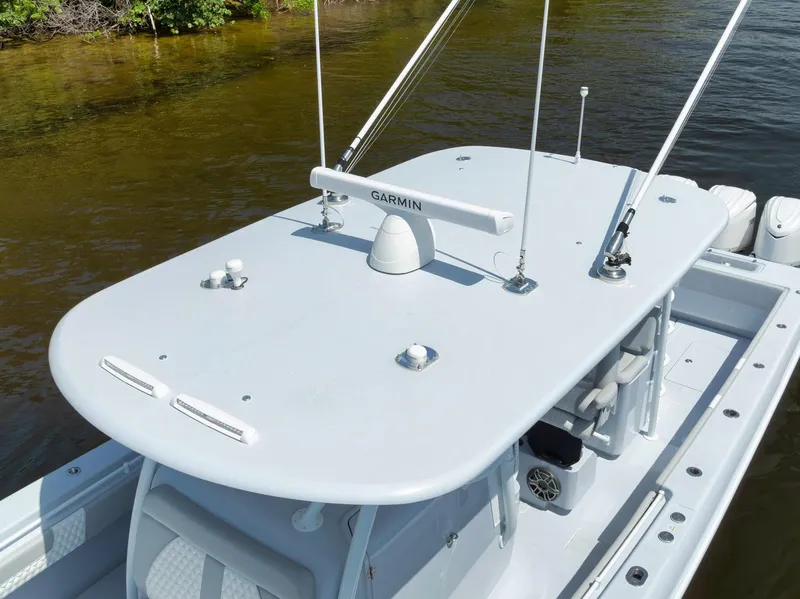 Slide: The Image of 2025 Contender 44 ST boat with Garmin radar, top view on water. - 14