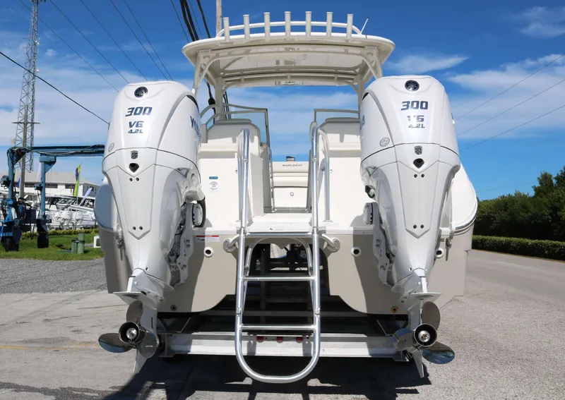 Slide: The Image of 2025 World Cat 296DC boat with dual 300 horsepower engines, rear view. - 4