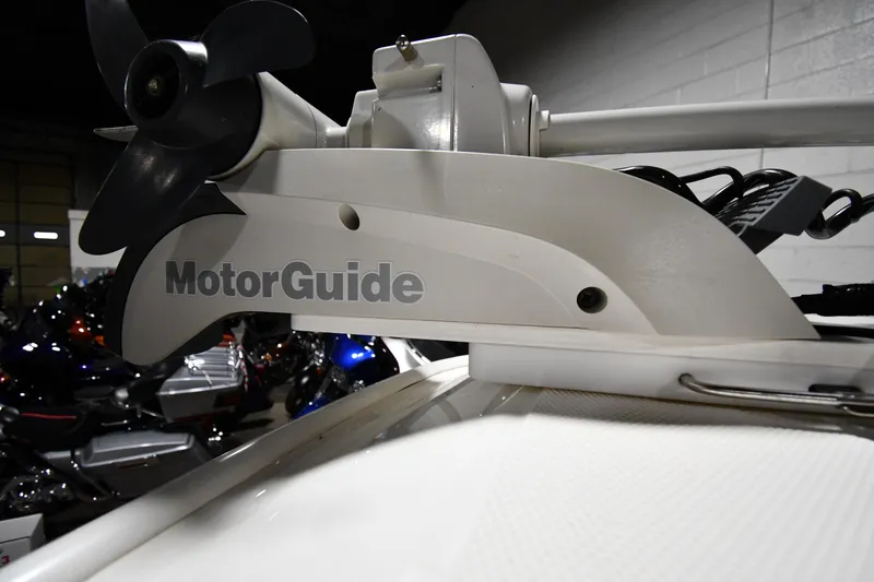 Slide: The Image of MotorGuide motor on 2022 Boston Whaler 250 Dauntless boat, indoor setting. - 42