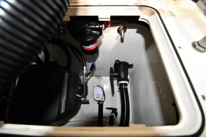 Slide: The Image of Engine compartment of 2022 Boston Whaler 250 Dauntless, showcasing internal components and wiring. - 45