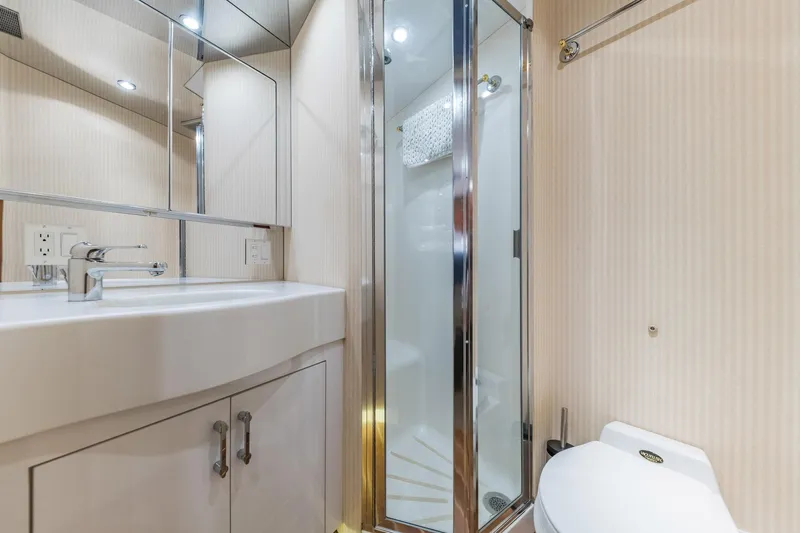 Slide: The Image of Bathroom interior of 1999 Hatteras 60 Convertible yacht with shower and sink. - 37