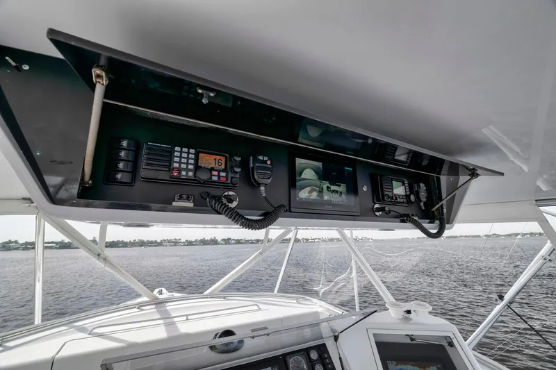 Slide: The Image of Control panel of 1999 Hatteras 60 Convertible yacht with navigation equipment. - 45