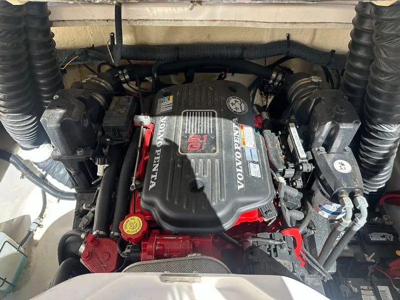 Slide: The Image of 2006 Regal 2450 Cuddy engine compartment with Volvo Penta motor. - 31