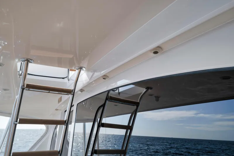 Slide: The Image of Viking 70 Convertible 2015 yacht ladder with ocean view. - 27