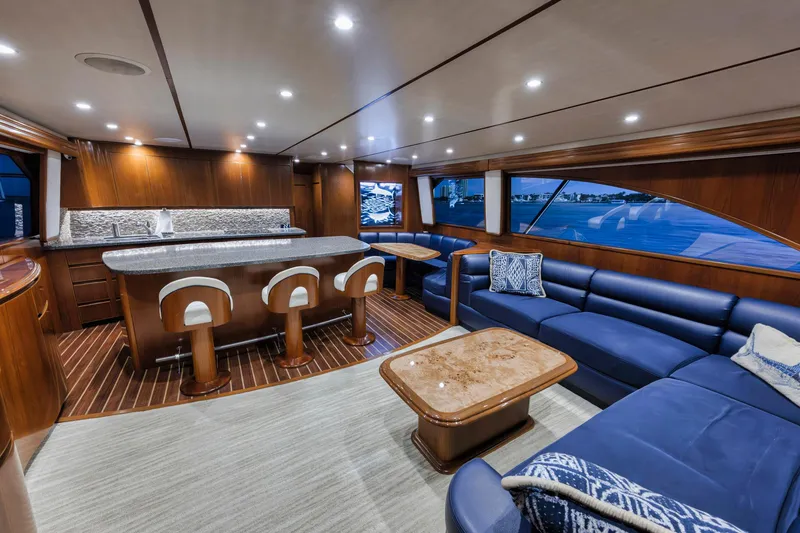 Slide: The Image of Luxurious interior of 2015 Viking 70 Convertible yacht with elegant seating and modern design. - 29