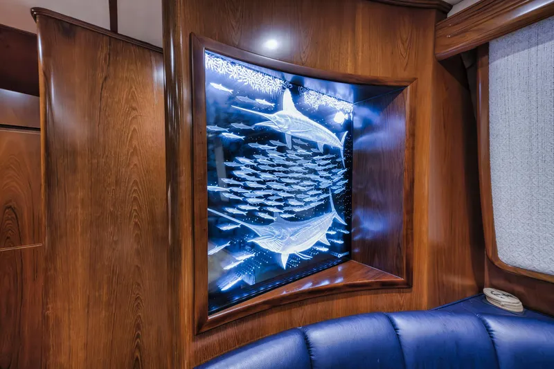 Slide: The Image of Interior of 2015 Viking 70 Convertible yacht with illuminated marine artwork. - 37