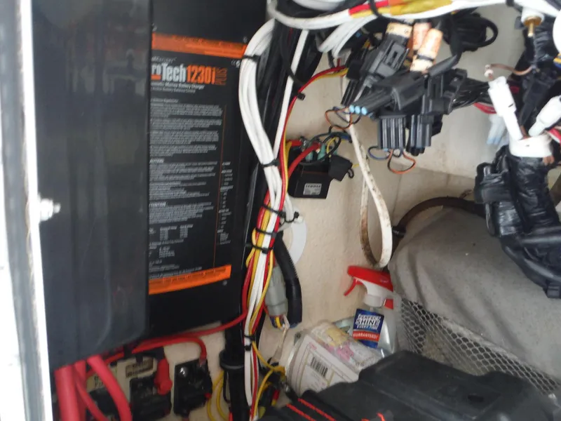 Slide: The Image of Electrical wiring and components inside a 2012 Regulator 32 Forward Seating boat. - 29