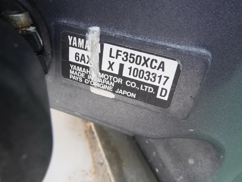 Slide: The Image of Yamaha LF350XCA engine label on 2012 Regulator 32 Forward Seating boat. - 48