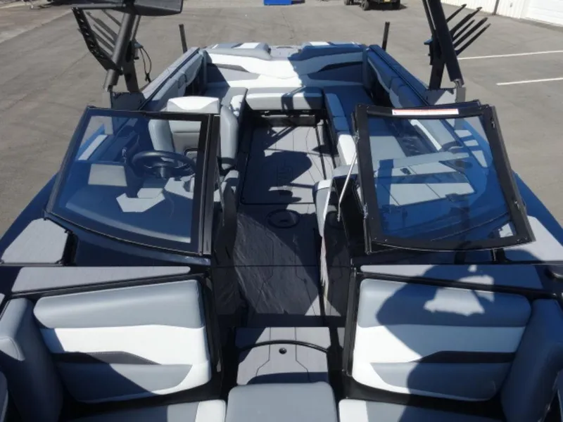 Slide: The Image of 2025 Axis T250 boat interior with sleek seating and modern design. - 16