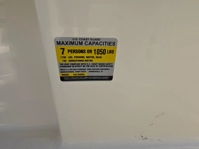 Slide: The Image of Capacity label on 2024 Scout Honda Seabrook 195 CF, 7 persons or 1050 lbs limit. - 10