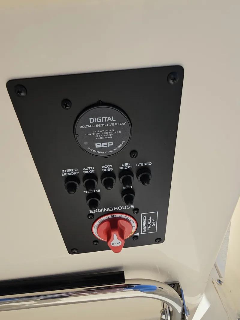 Slide: The Image of Control panel of 2024 Scout Honda Seabrook 195 CF boat, featuring digital voltage relay. - 18