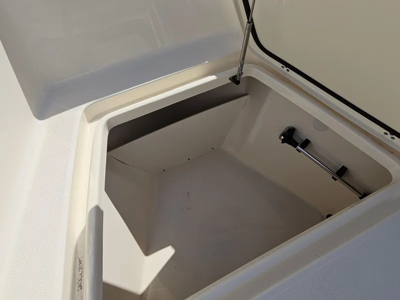 Slide: The Image of 2024 Scout Honda Seabrook 195 CF storage compartment, open lid, spacious interior. - 23