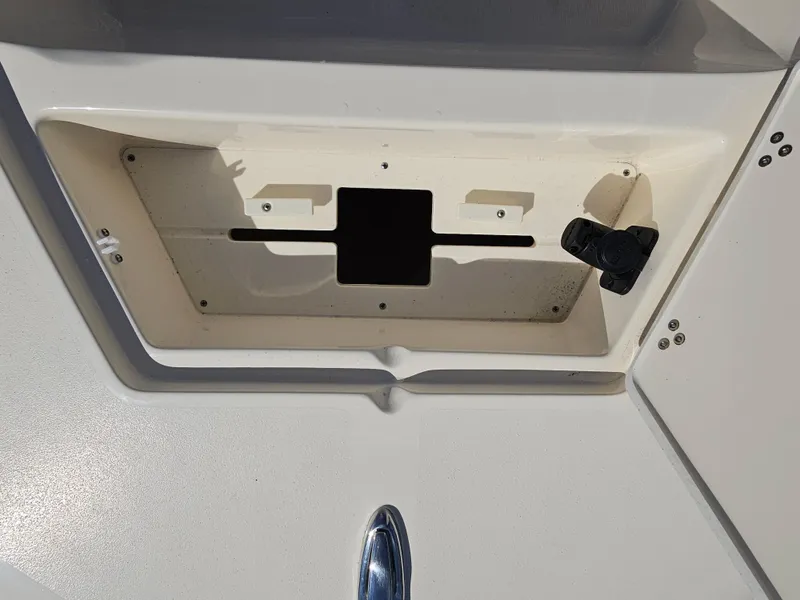 Slide: The Image of 2024 Scout Honda Seabrook 195 CF boat compartment detail with white interior. - 24